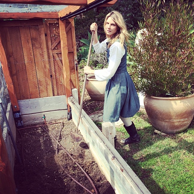 Angela Lindvall poses in her garden wearing Chanel