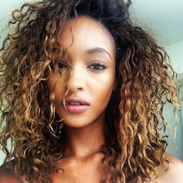 Jourdan Dunn with a curly blondish hairdo