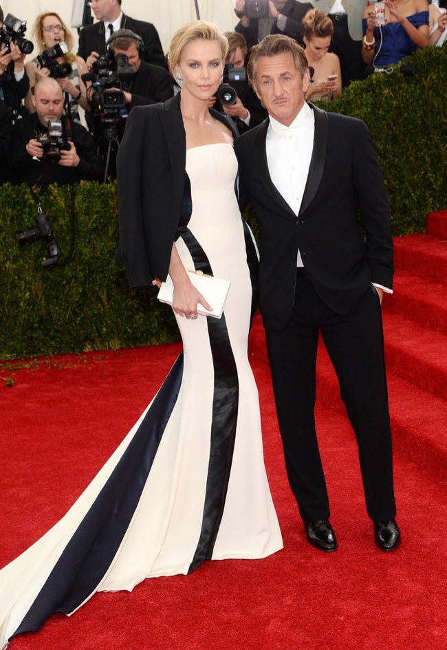 Charlize Theron wears black and white Dior alongside Sean Penn