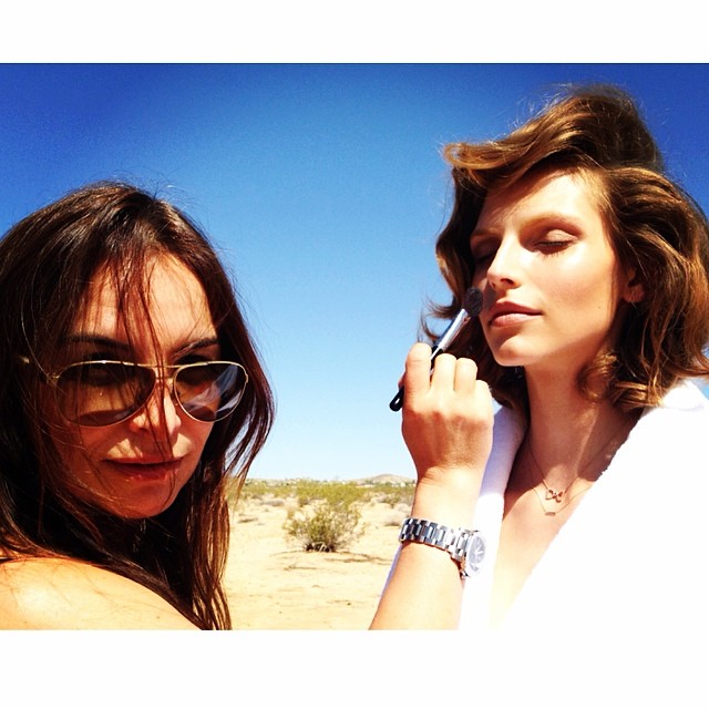 Karlina Caune gets a touch up on set