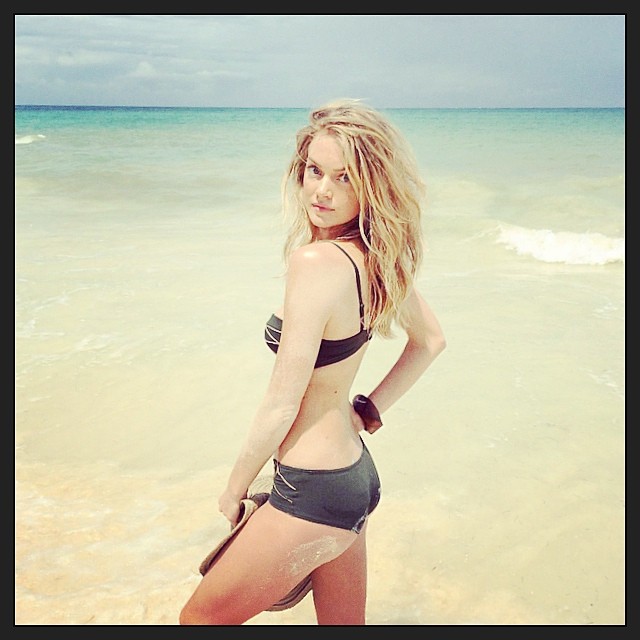 Lindsay Ellingson at the beach for Grazia