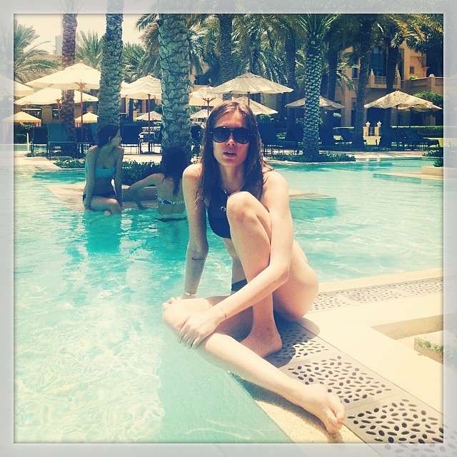 Nadja Bender poses poolside