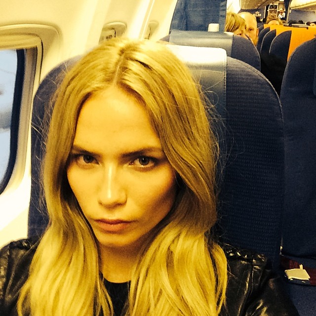 Natasha Poly on a plane