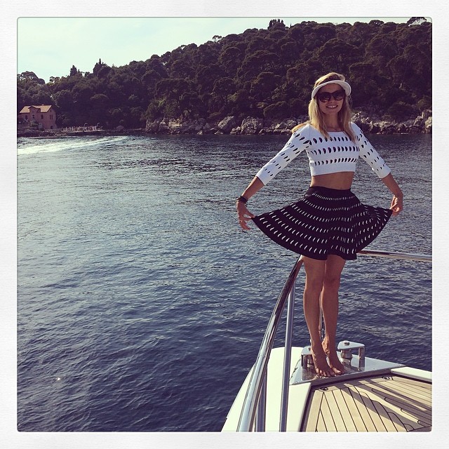 Jessica Hart poses on a boat