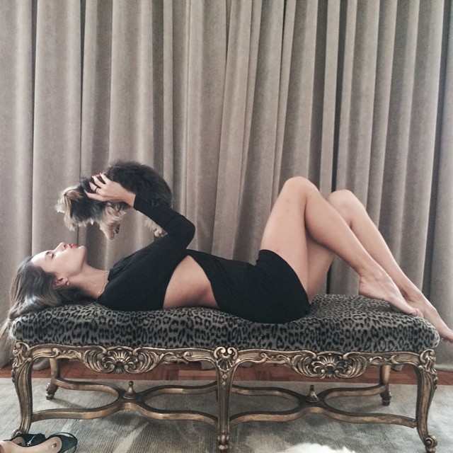 Alessandra Ambrosio poses with a cat