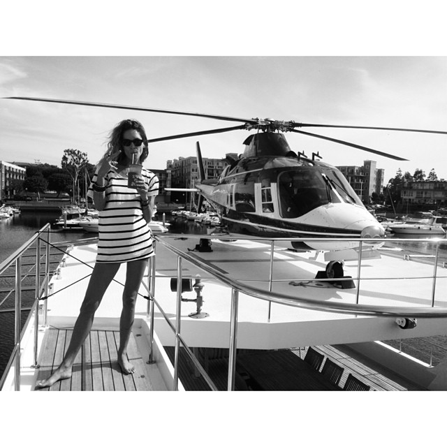 Erin Wasson poses on a boat