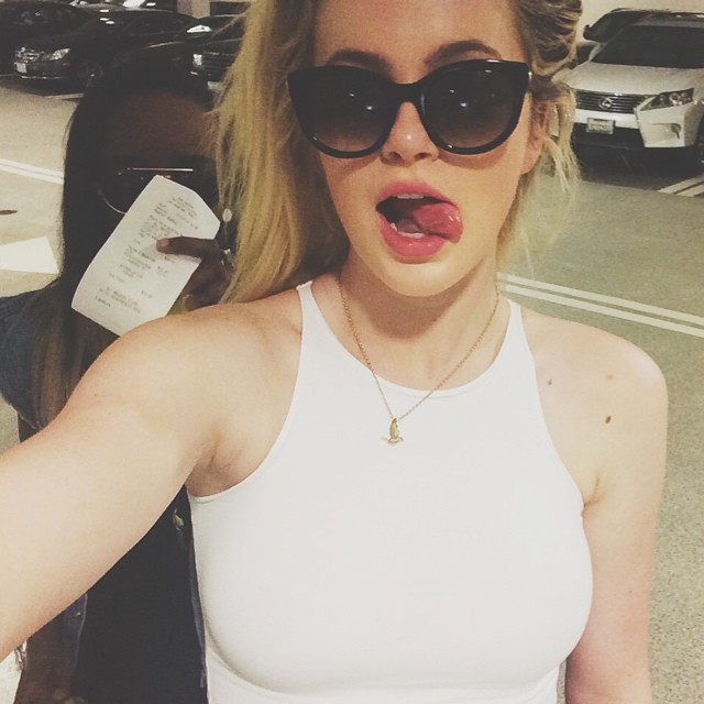 Ireland Baldwin flashes her tounge