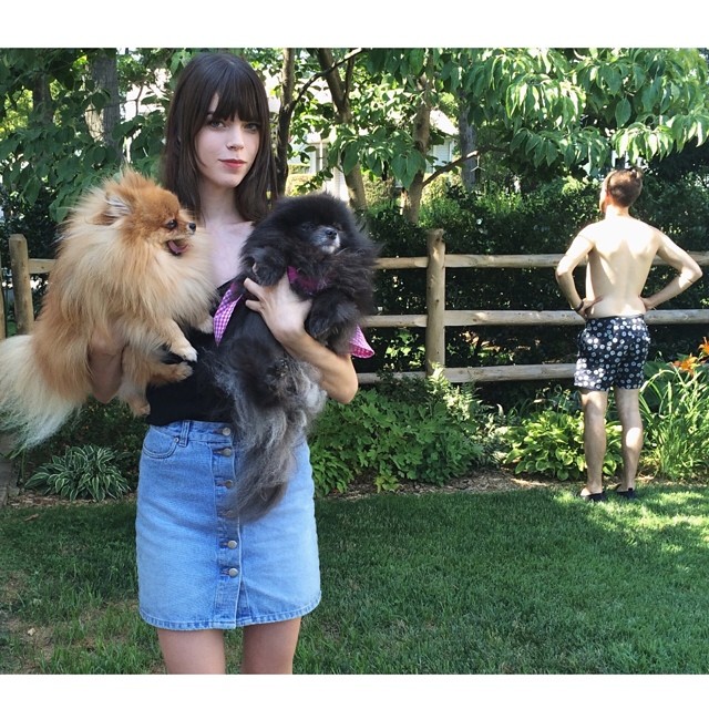 Megan Collison poses with pooches