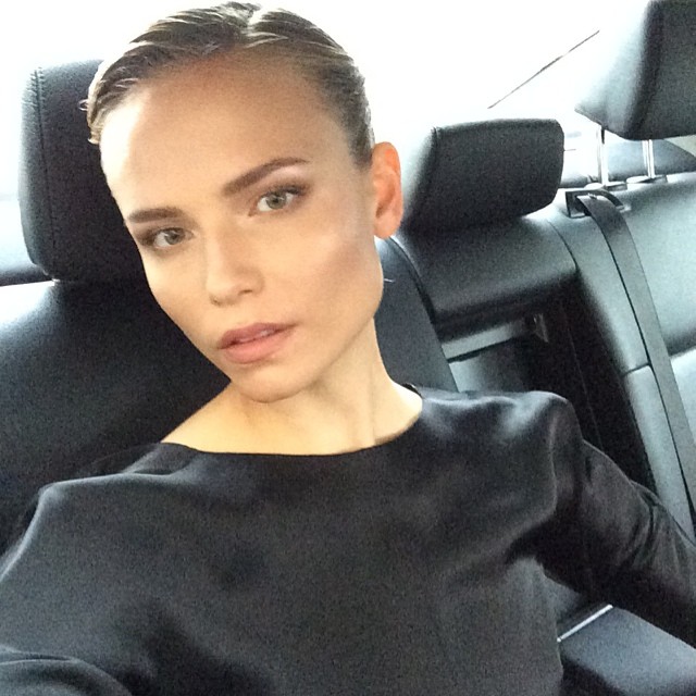 Natasha Poly takes a selfie before a Vogue Paris event