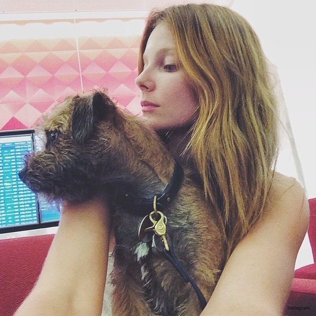 Eniko Mihalik poses with dog