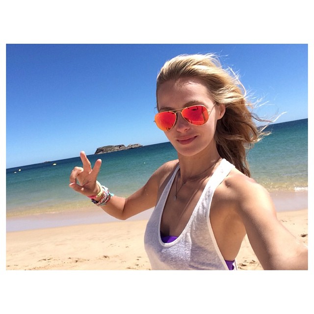 Valentina Zelyaeva in sunglasses at the beach