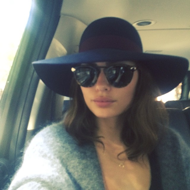 Alyssa Miller looks chic in glasses and hat