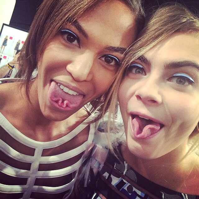 Joan Smalls and Cara Delevingne make funny faces