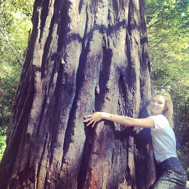 Karlie Kloss is a tree hugger (literally)