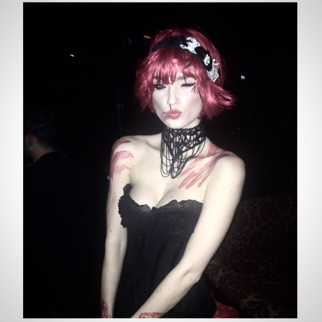 Alek Alexeyeva dons a red wig