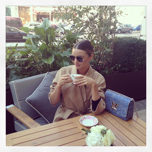 Miranda Kerr poses with tea