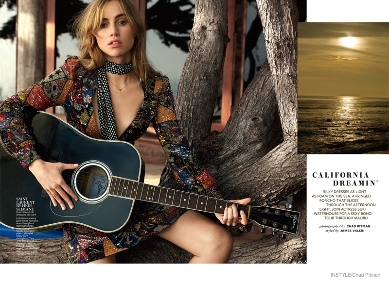 Suki Waterhouse plays the guitar while wearing Saint Laurent by Hedi Slimane
