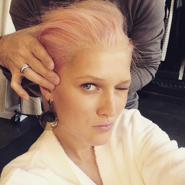 Toni Garrn tries on a pink hairstyle