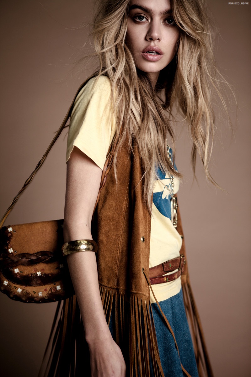 Leather Fringe Vest, Belts, Bag & Denim Skirt available at Stoned Immaculate Vintage, Vintage Woodstock Tee from Filth Mart, Gold Bangle & Owl Necklace from Greta Garbage Vintage 