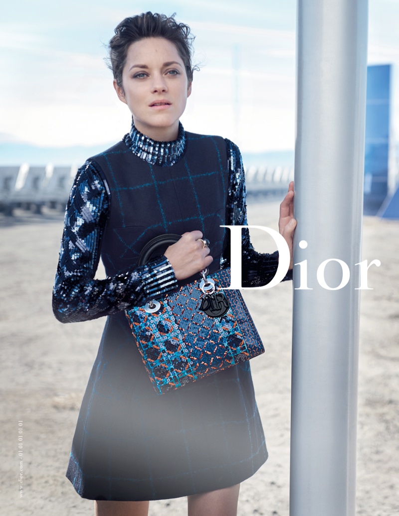 The images feature a futuristic landscape photographed by Peter Lindbergh.