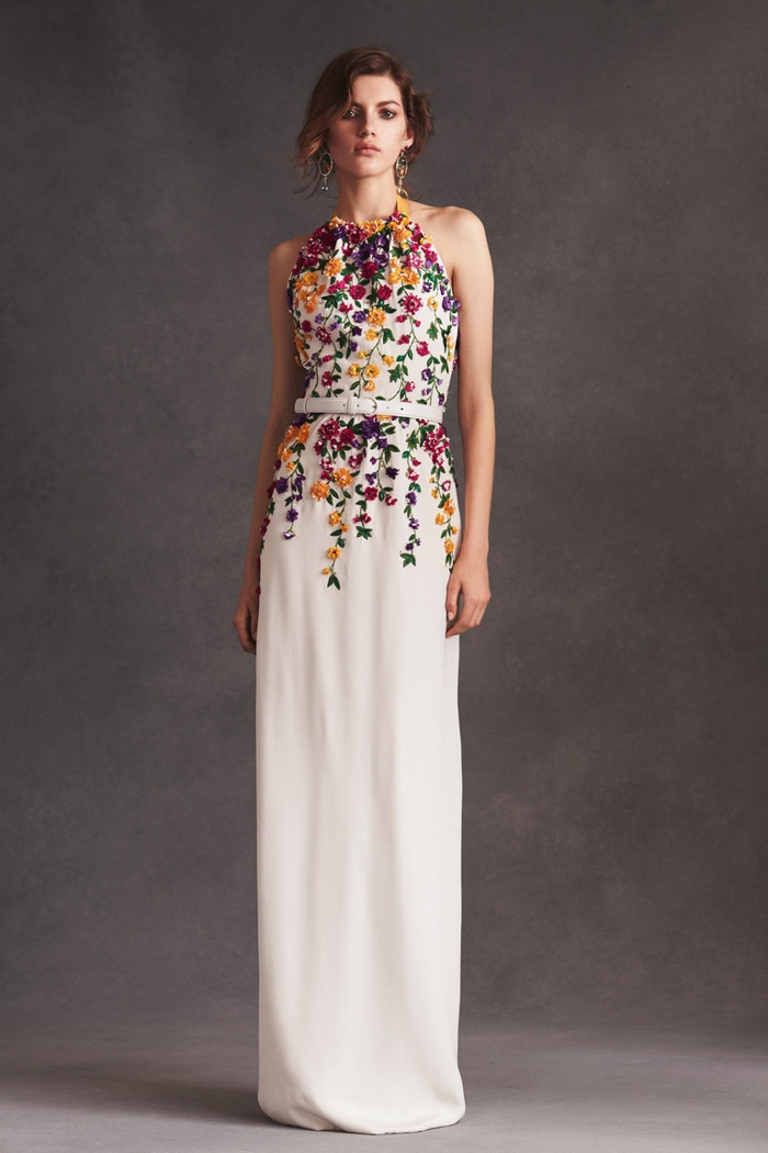 OSCAR DE LA RENTA: Peter Copping's first resort collection for the brand featured this floral embroidered dress, a bold yet elegant look.