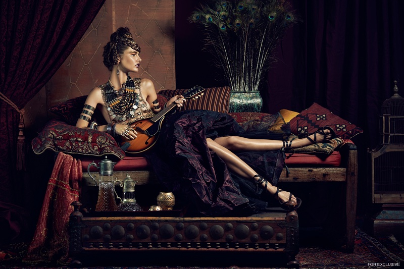 Necklace Masha Archer, Custom Made Chain Top, Arm Bands and Rings Erika Peña; Assorted Bangles Masha Archer and Steven Anton Rehage, Skirt Elie Saab, Earrings Steven Anton Rehage, Shoes Ann Demeulemeester