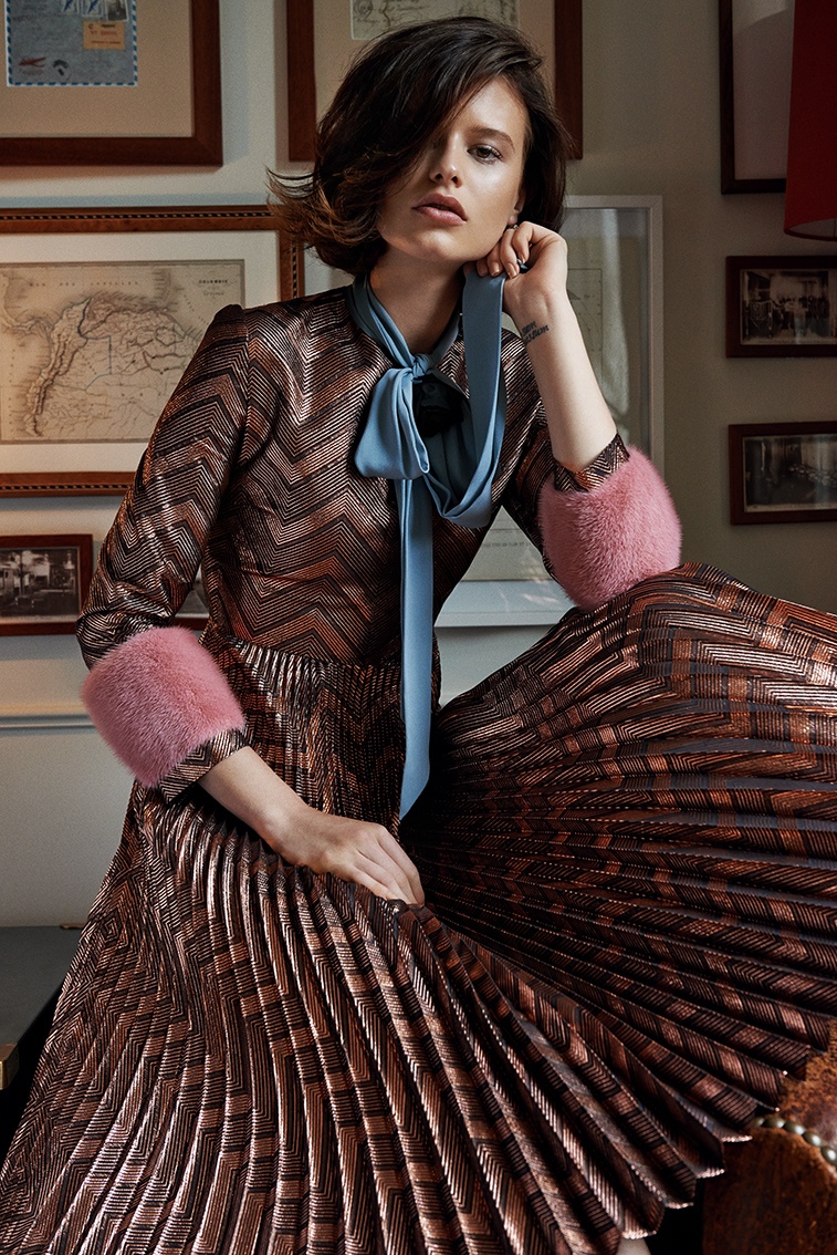 Barbora wears pleated dress with fur detailing from Gucci