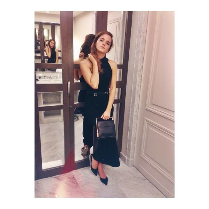 Emma Watson wears Edun dress with Paul Andrew flats and Lautem handbag