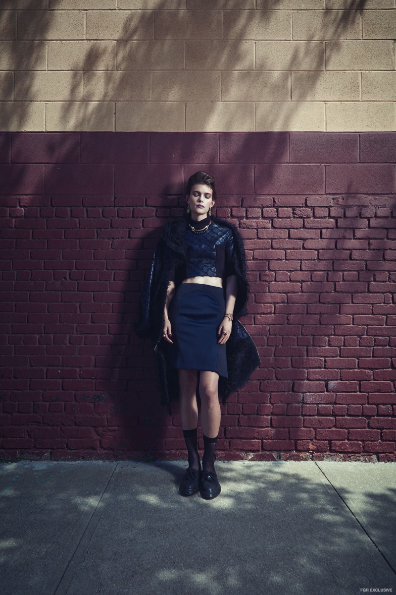 Leather Parka Daniel Silverstain, Top Daniel Silverstain, Skirt Daniel Silverstain, Shoes Dr. Martens, Socks Stylist’s own, Necklace Biko, Rings Mary Ellen Gallagher, Ayaka Nishi; Earrings Ayaka Nishi, Bracelet Mary Ellen Gallagher