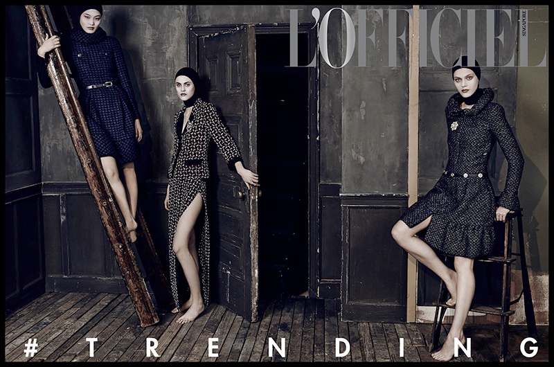 The three models wear looks from the autumn collections in the editorial