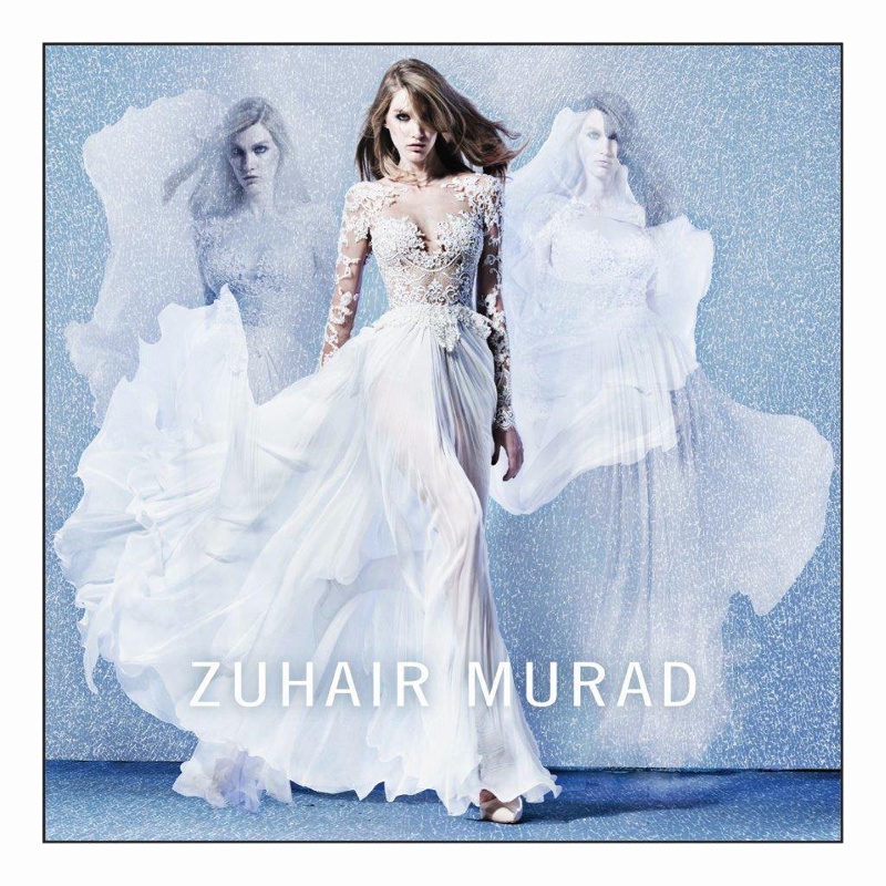 The model looks ethereal in a white gown
