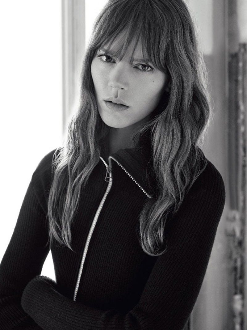 Freja Beha wears her signature hairstyle with wavy tresses and blunt bangs