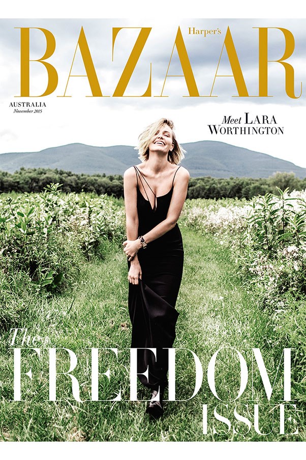 Lara Worthington (née Bingle) graces the November 2015 cover of Harper’s Bazaar Australia. The star poses for Russell James in an outdoor setting. 