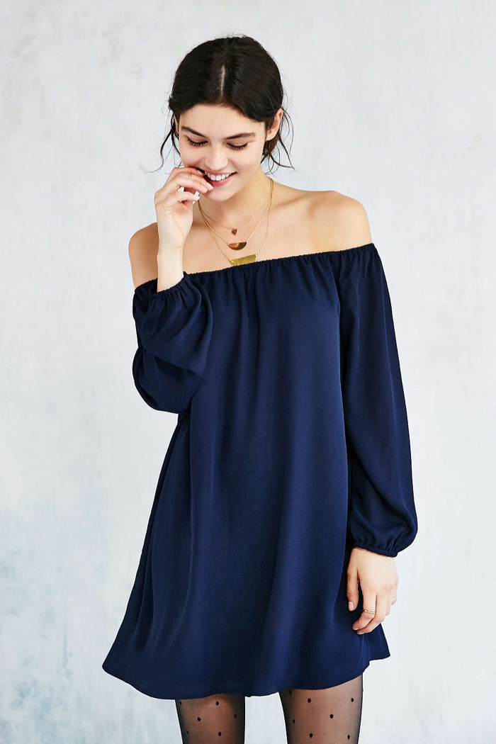 Sorella Vita Off the shoulder abstract cut dress with asymmetric hemline. Unusual shape with folds and points in different directions that makes a quirky change from mai.