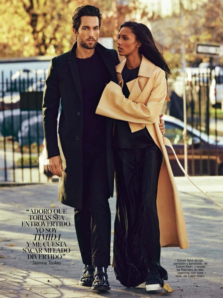 The model pair wears his & hers style with coat looks