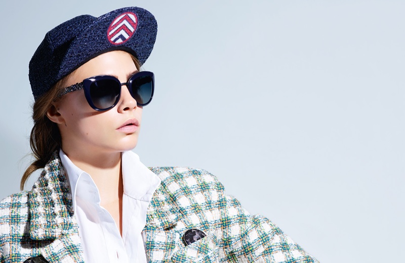 Modeling a tweed jacket and baseball hat, Cara Delevingne fronts Chanel Eyewear's spring 2016 advertising campaign