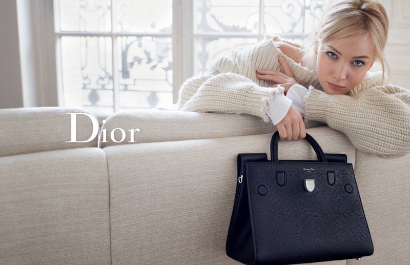 Jennifer Lawrence models a Dior sweater and Diorama bag in the brand's spring 2016 handbag campaign