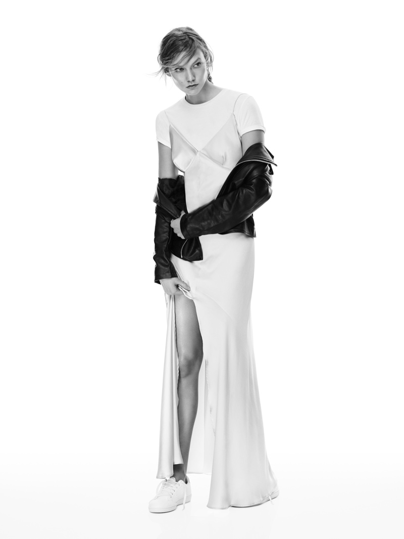 Photographed in black and white, Karlie Kloss wears Mango's long slip dress, white shirt and jacket