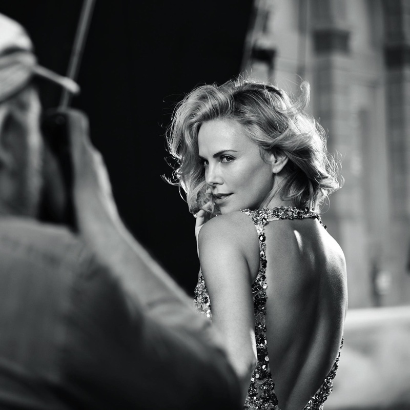 Charlize Theron poses behind the scenes at J'adore Dior campaign