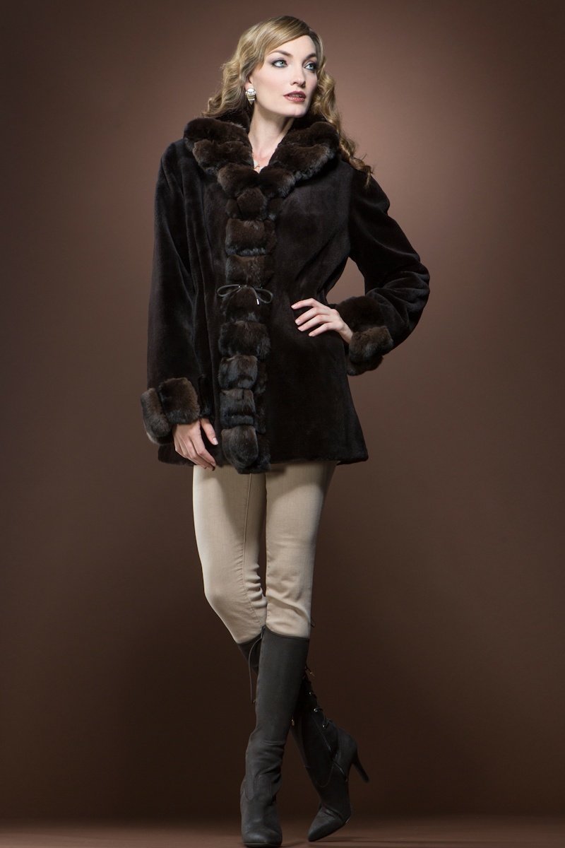 EM EL Reversible Brown Sheared Mink and Chinchilla Fur Jacket $5,099 - Channel your inner 1940s movie star in a chinchilla fur jacket. Wear over an elegant gown during a special occasion or have it more casual with some trousers.