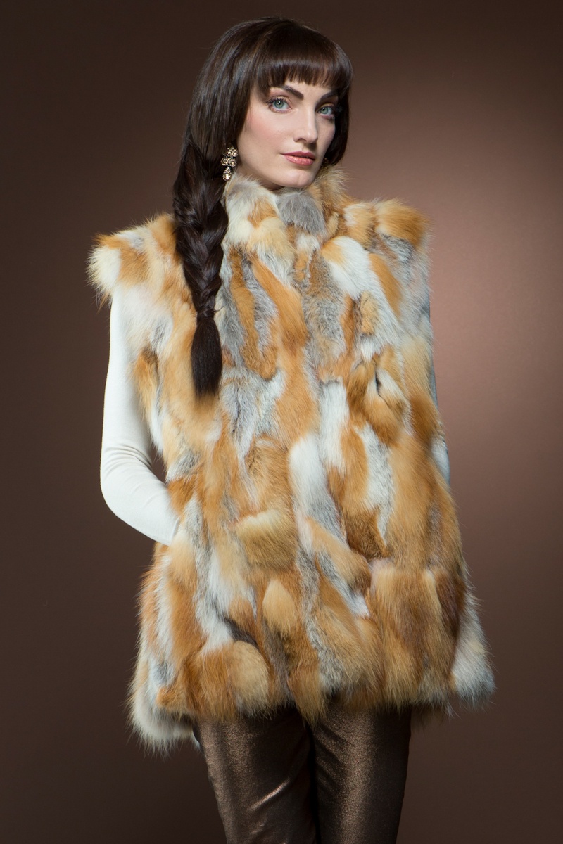 Mary McFadden Red Patchwork Fox Fur Vest $1,395 - Take on a retro look with this red fox fur vest. Sport with some skinny jeans for a cool girl look.