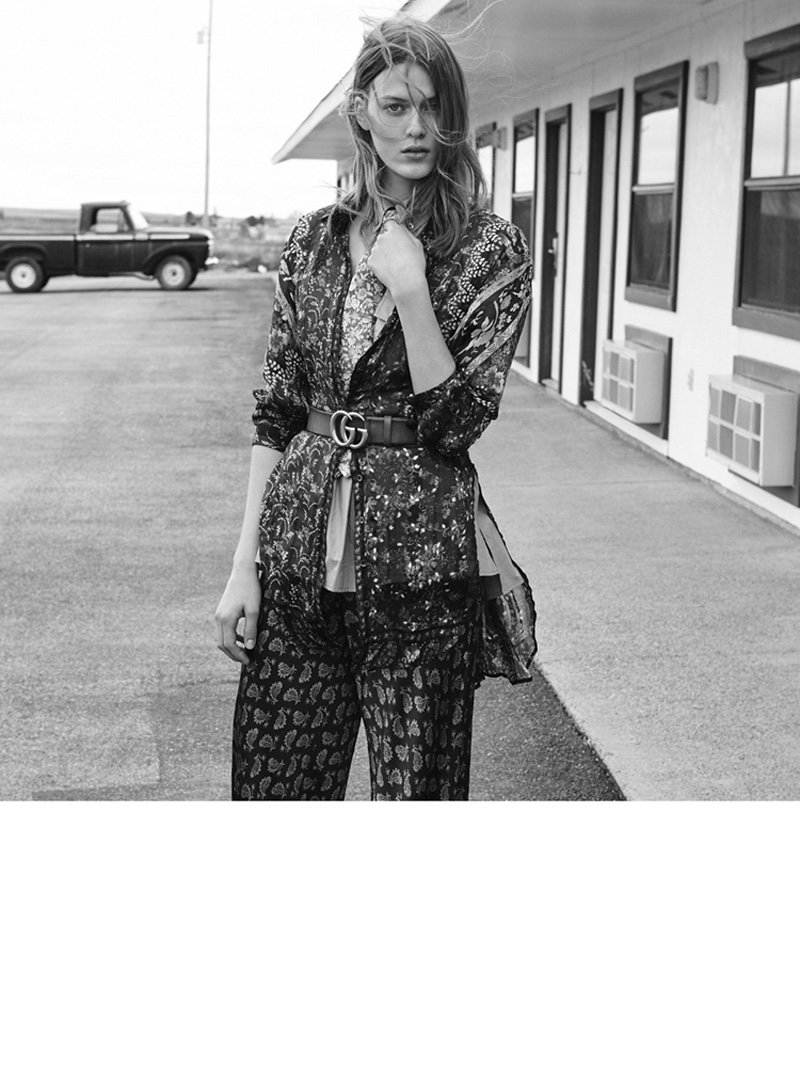 Tess suits up in a relaxed jacket and pants with Gucci belt