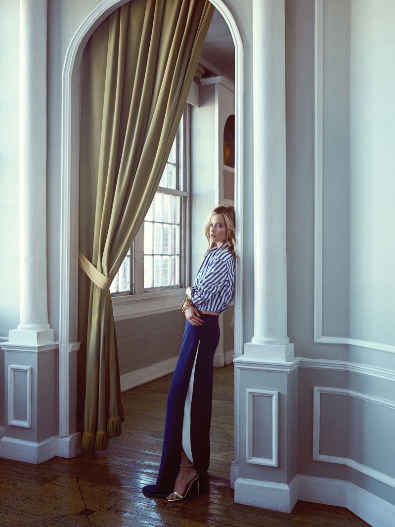 Carolyn Murphy serves nautical vibes with a striped shirt and palazzo pants from Ralph Lauren
