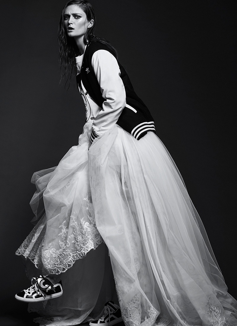 Photographed by Chris Nicholls, the model poses in maxi dresses and skirts