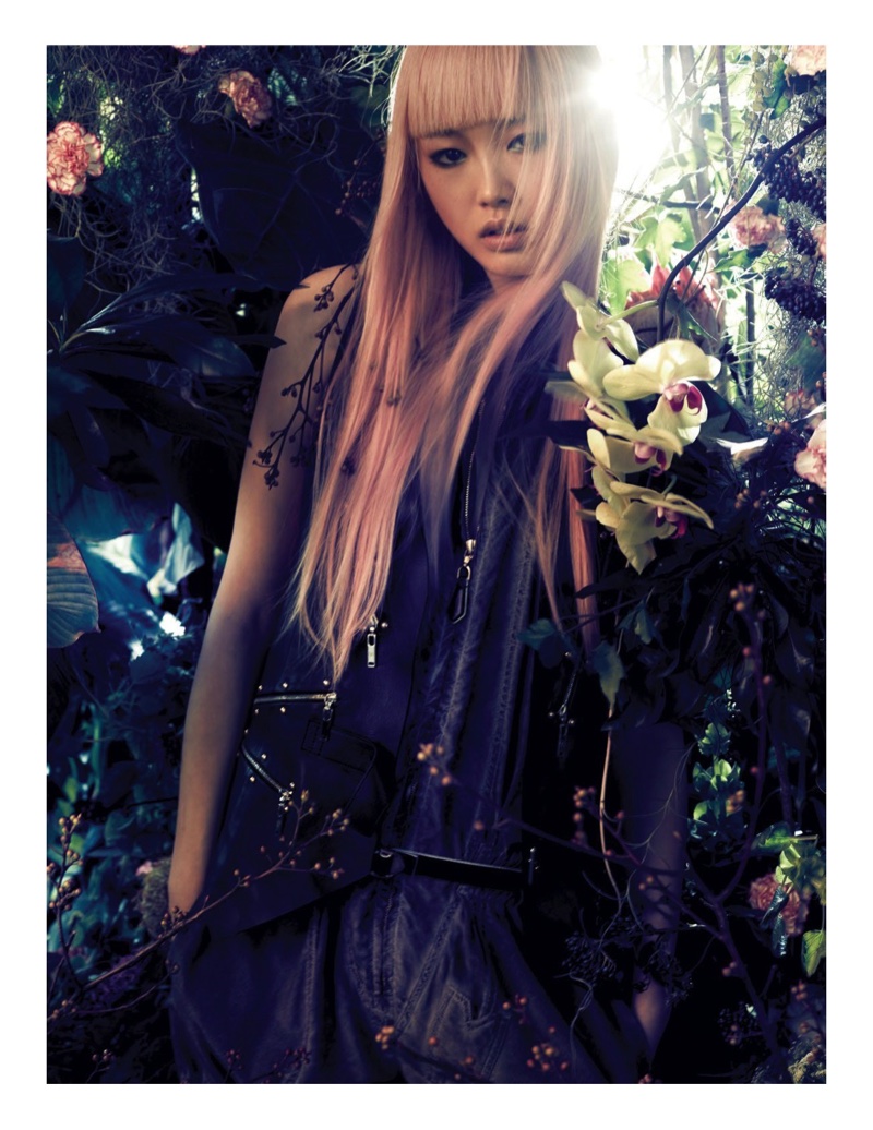 Showing her sleek bangs, Fernanda poses among botanical blooms