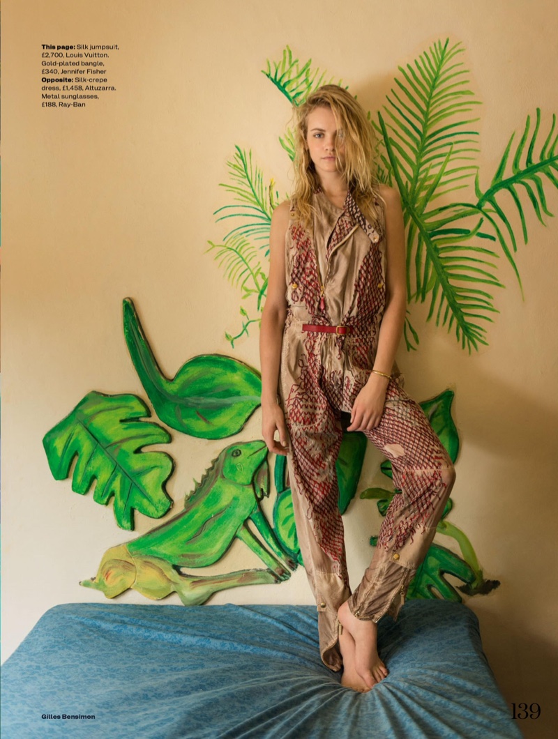 The model goes indoors in a Louis Vuitton jumpsuit