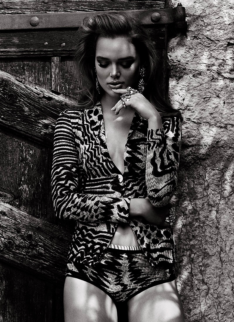 The brunette wears a Missoni sweater and briefs