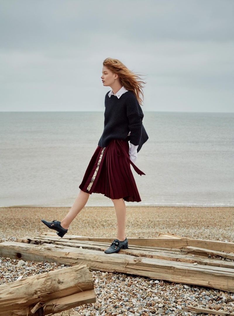 Walking the beach, Hollie-May models shirt, cashmere sweater, skirt and shoes from Dior