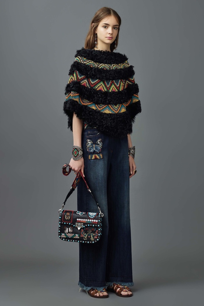 Valentino Resort 2017: Embellished poncho with denim pants featuring patchwork pocket and frayed hem