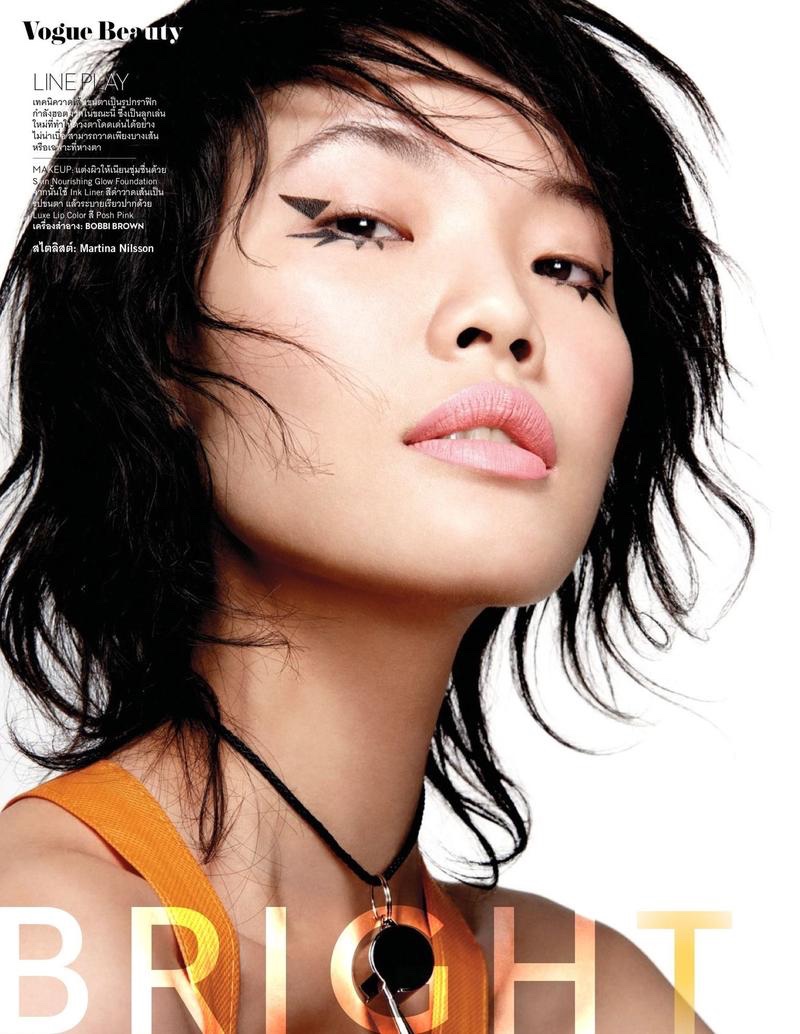Chen Lin models bright makeup looks for the beauty editorial